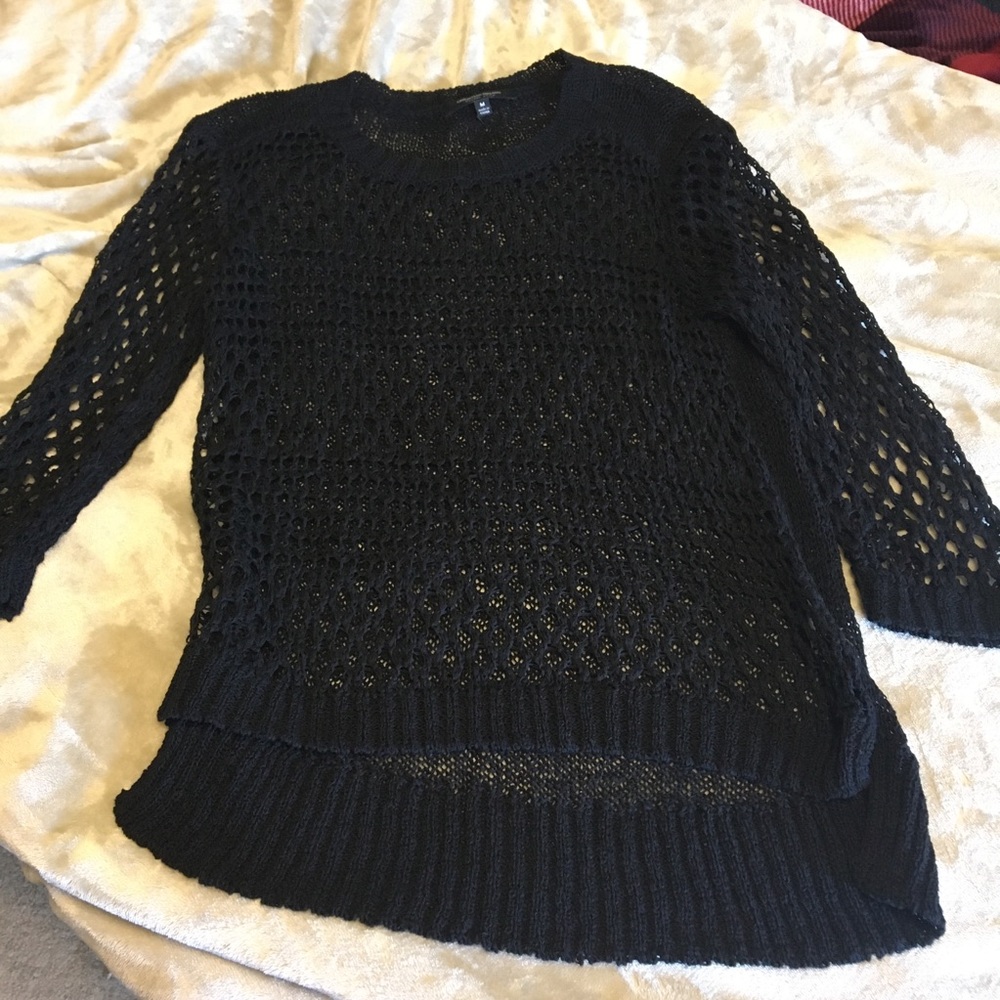 Christian Siriano runway style black open knit top
